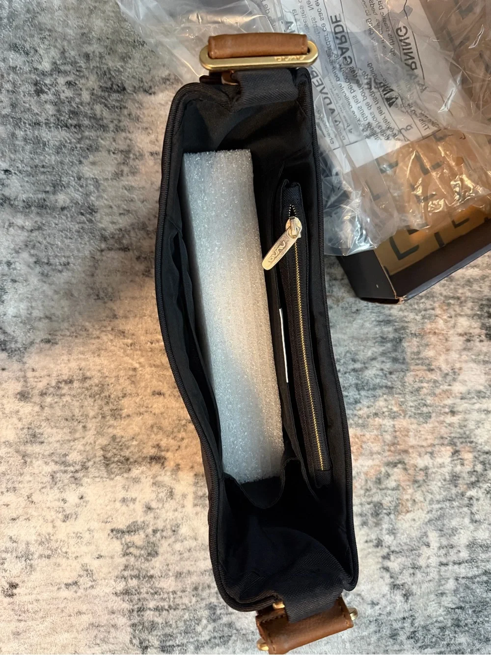 Black NUNA stroller organizer